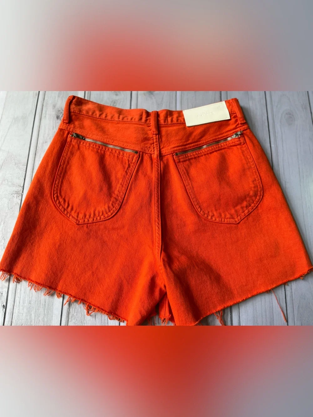 Women’s 7 for all Mankind Easy Ruby Orange raw hem button fly Jean short.Size 26